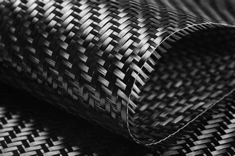  Carbon Fiber: Een Revolutionair Material voor Lichtgewicht en Hoge Sterkte Toepassingen!